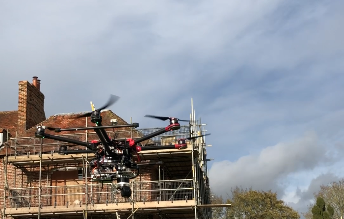 Image of drone flying on a construction site